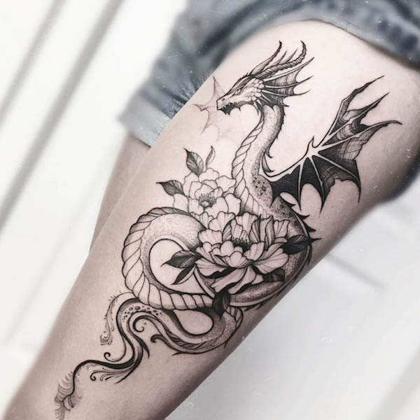 feminine dragon with flowers tattoo