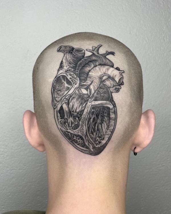 Human heart head tattoo