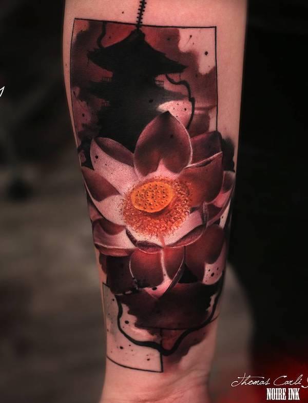 Glowing lotus tattoo