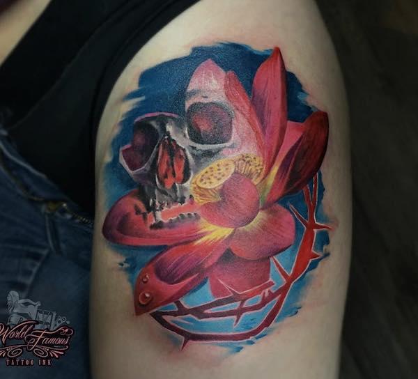 Skull lotus tattoo
