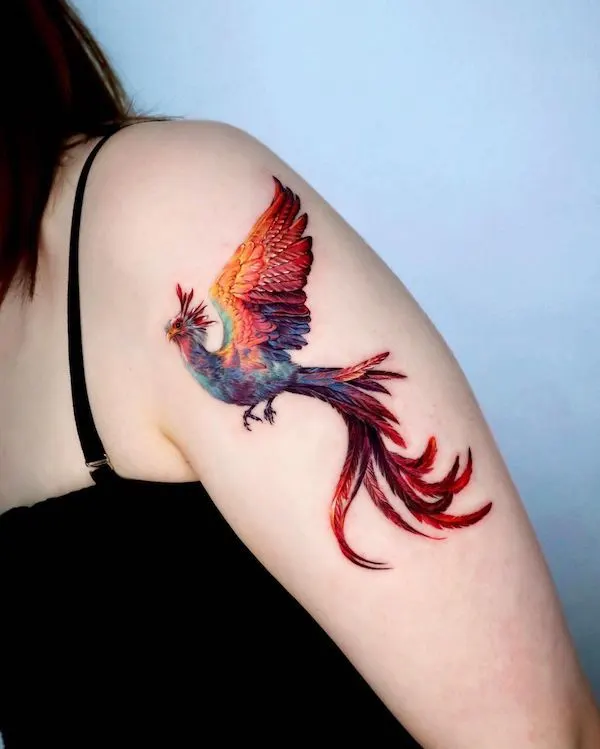 Mesmerizing phoenix tattoo on upper arm