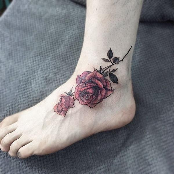 Blue and pink chrysamthemum matching tattoo on feet