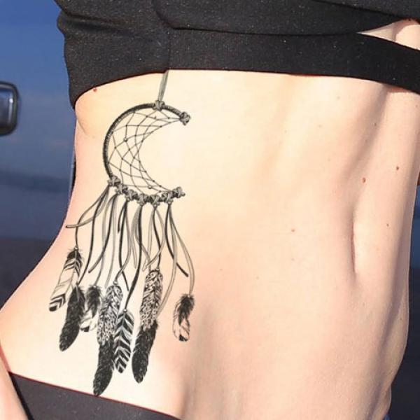 Half wheel dreamcatcher tattoo