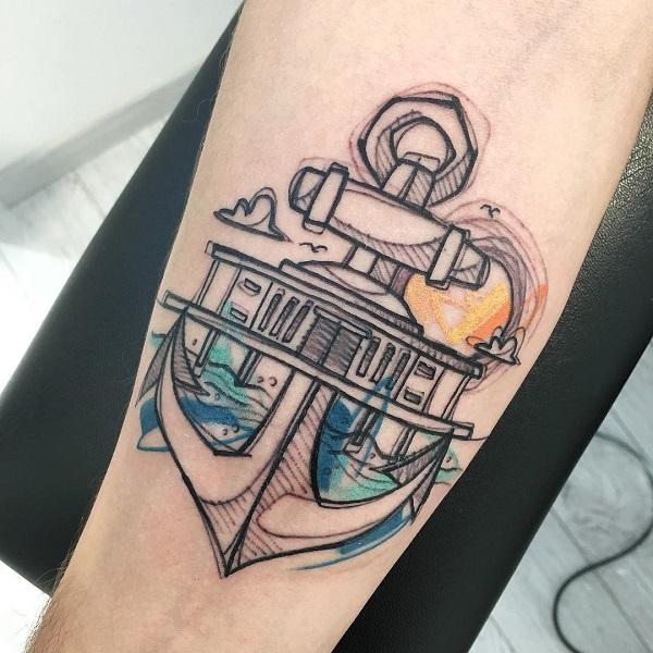 Illustrative anchor with lighthouse tattoo
