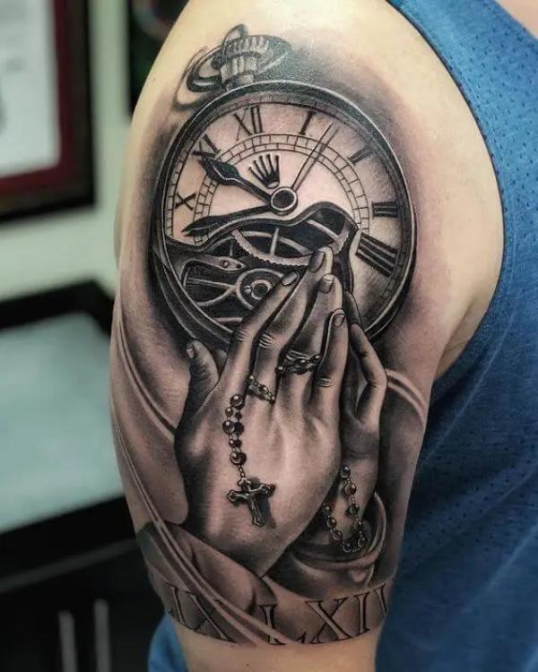 Praying hands with clock tattoo
