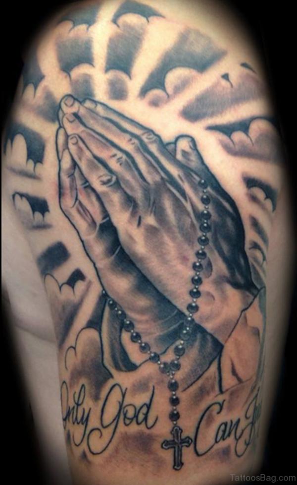 Praying hands with halo