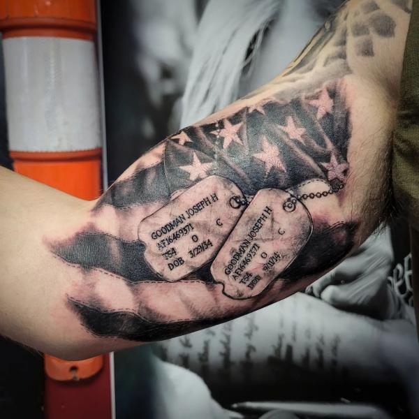 Weathered American flag with dog tags ink design