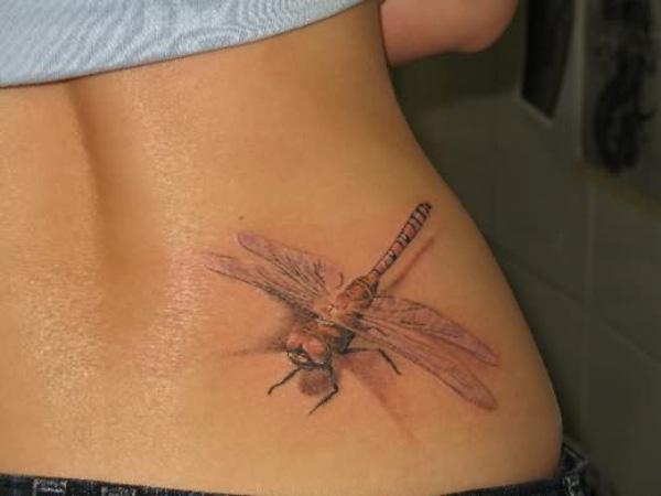dragonfly tattoo Low back Dragonfly tattoo in realistic style