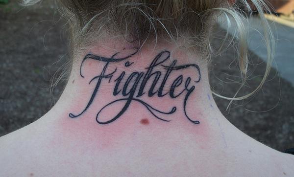 46 Font Tattoo on neck Motivational word Fighler tattoo on the neck