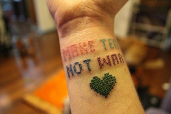 Small stitch tattoo Stitch wrist tattoo with scripts and heart shape symbol