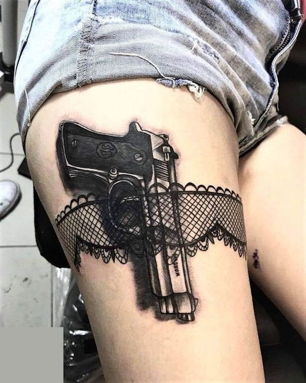 Cool Gun and garter tattoo