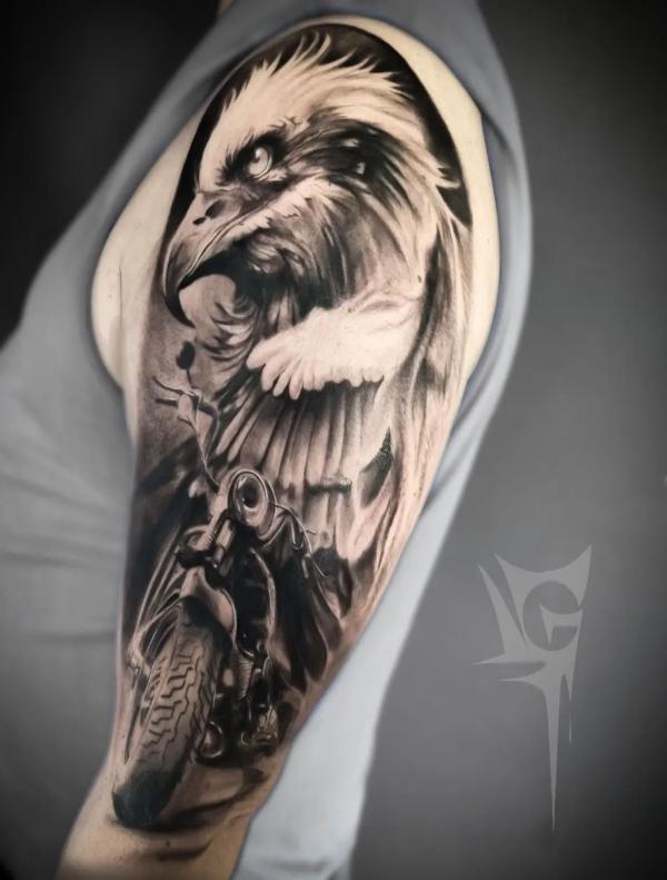 Cool eagle and motorcycle half sleeve tattoo