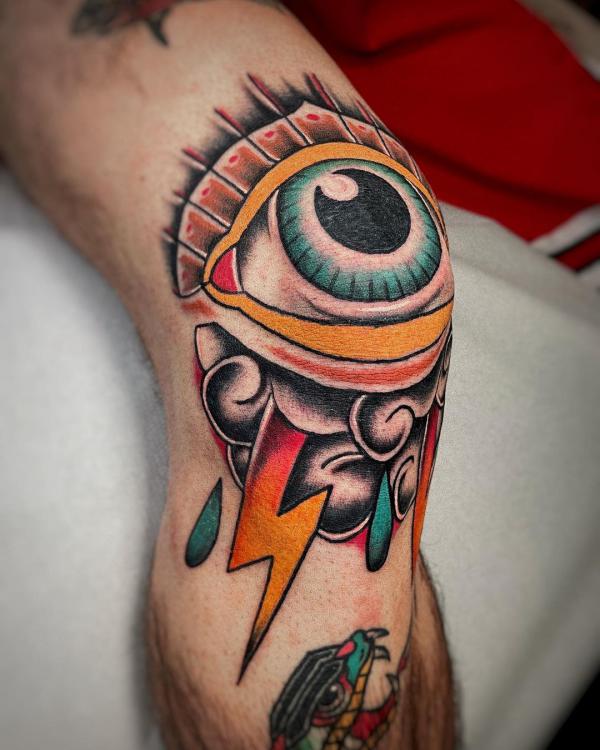 Cool eye and lightning bolt tattoo