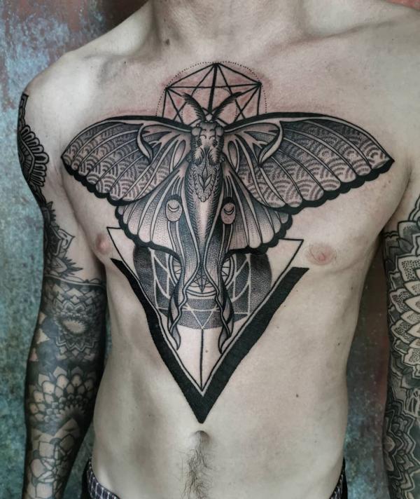 Large moth tattoo