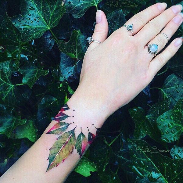 Little Tattoos  Tiny hand poked leaves on the wrist Tattoo