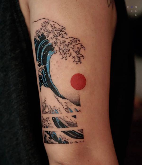 Small Japanese wave and sun tattoo