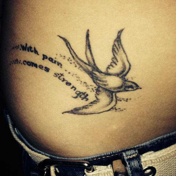 With pain comes strength tattoo with a swallow