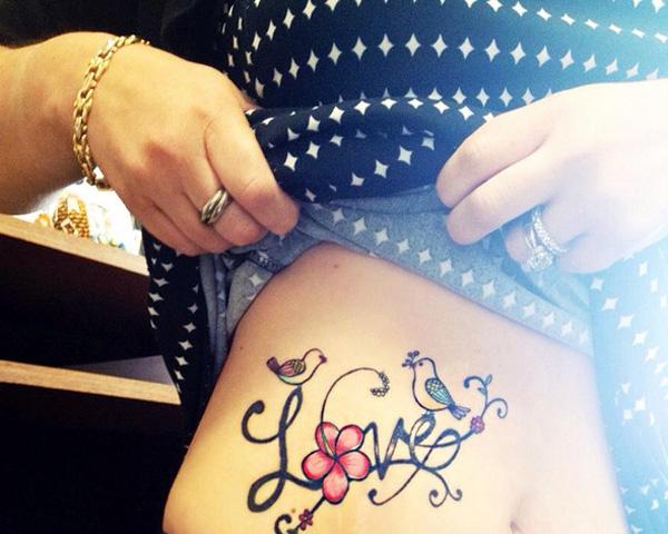 Bird courting tattoo