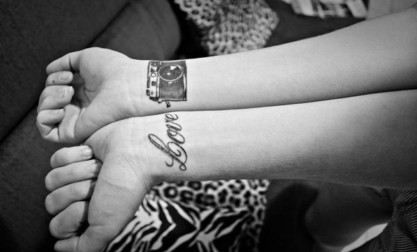 Love and camera tattoo black and grey