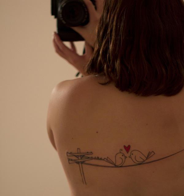 Two Love Birds on a wire back tattoo