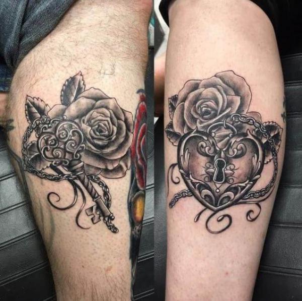 Black and grey lock and key with rose tattoo