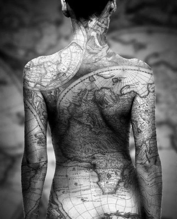 map tattoo picture Full body tattoo image with map covering from neck to back, arms and hip