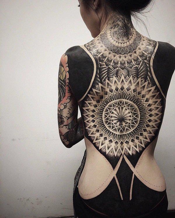 Blackwork mandala inspired fullback tattoo for women
