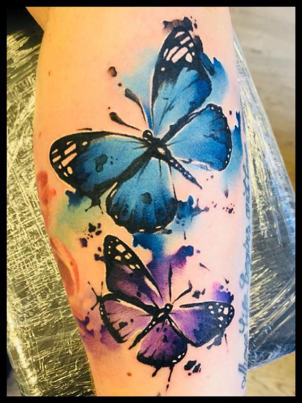 Blue and purple butterflies watercolor tattoo