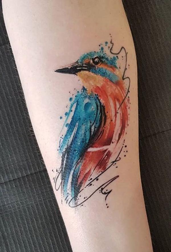Single watercolor bird tattoo