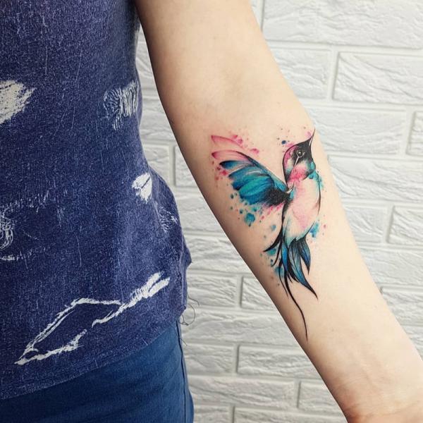 Single watercolor hummingbird tattoo