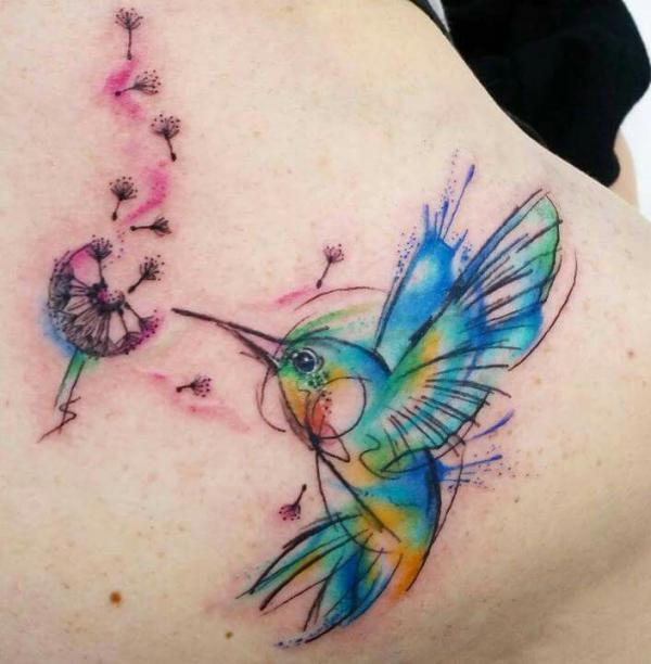 Watercolor hummingbird and dandelion tattoo