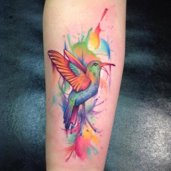 Watercolor hummingbird forearm tattoo