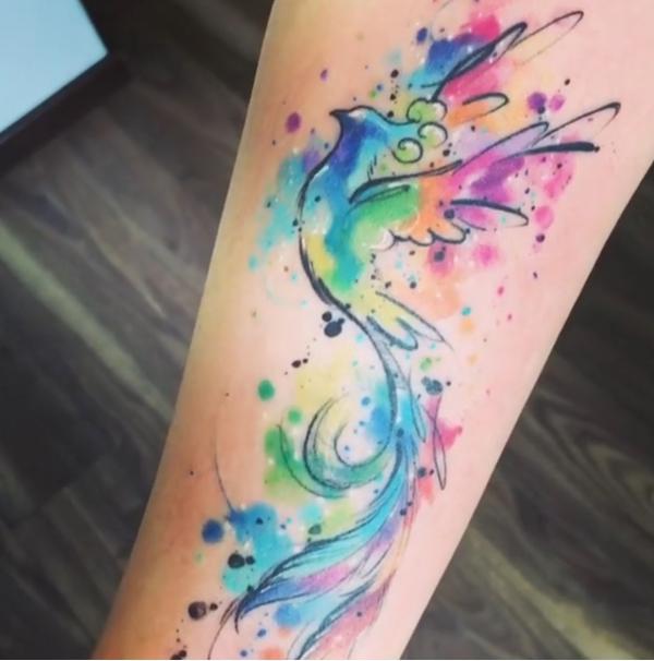 Watercolor phoenix forearm tattoo