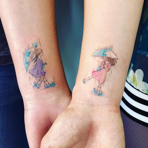 Watercolor sister tattoos Little girls playing in the rain with umbrellas