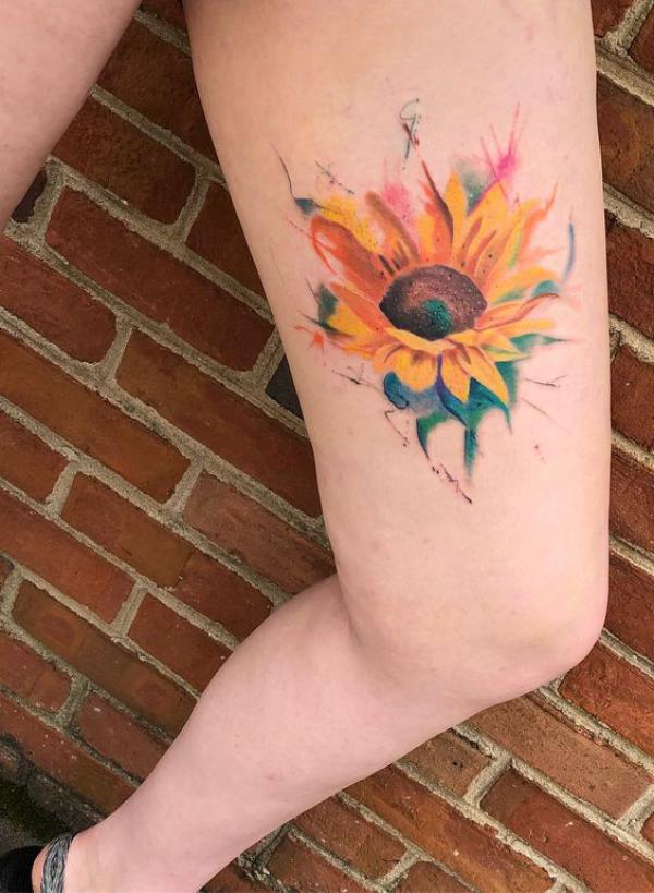 Watercolor sunflower tattoo on leg