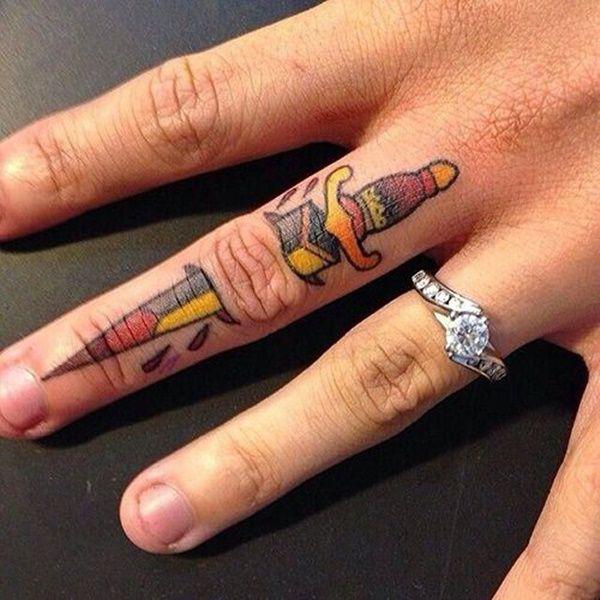 Finger sword tattoo