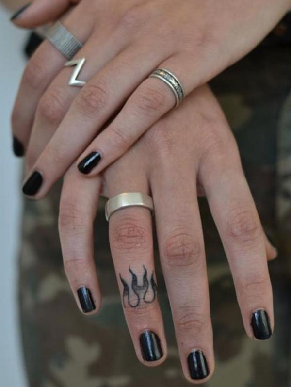 Flame finger tattoo