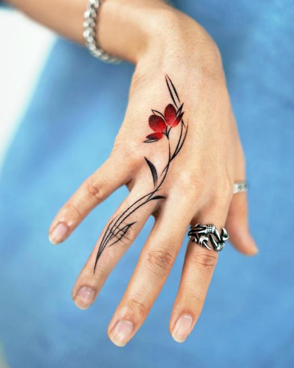 Flower ring deals finger tattoos