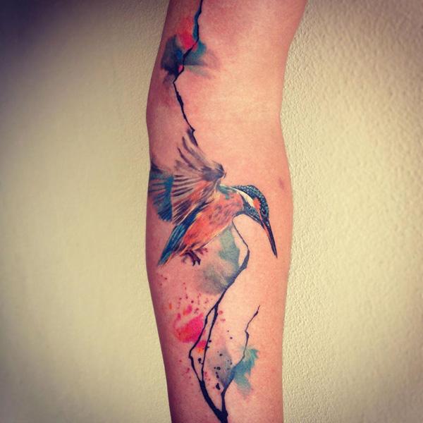 Flying Hummingbird And Orchid Flowers Tattoo On Left Foot