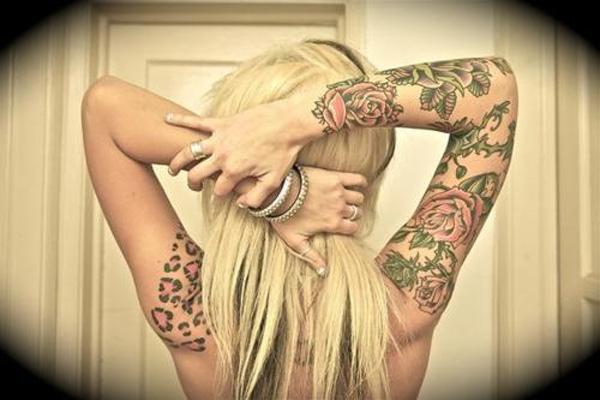 17 Leopard print tattoo on left shoulder