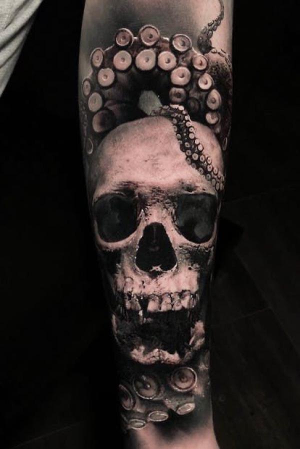 Black and grey octopus skull tattoo