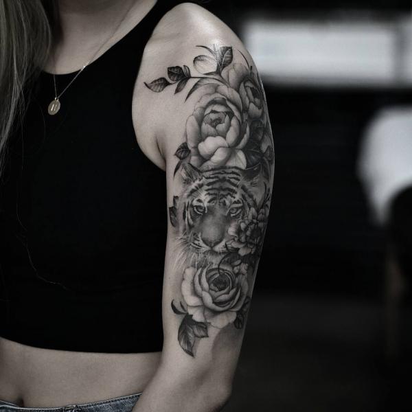 Black and grey tiger head and roses sleeve tattoo for women