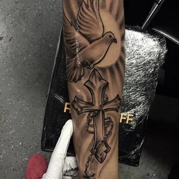 Dove and cross with sun