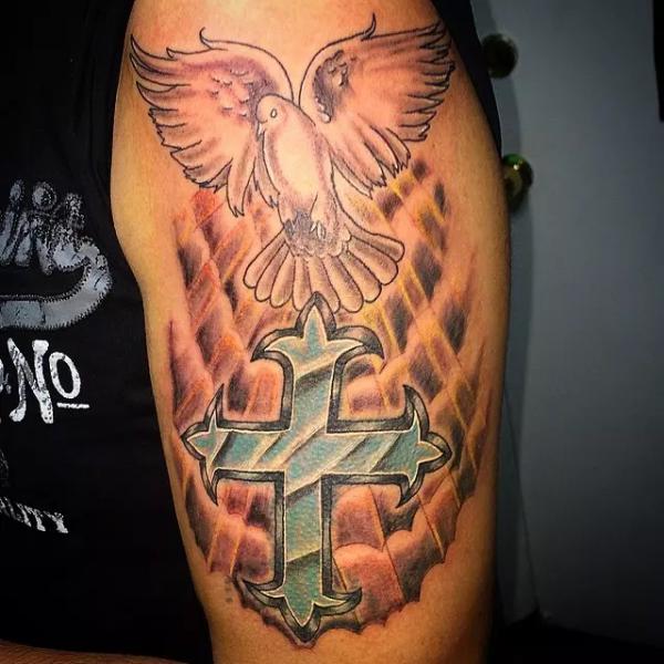 Holy spirit cross and dove tattoo