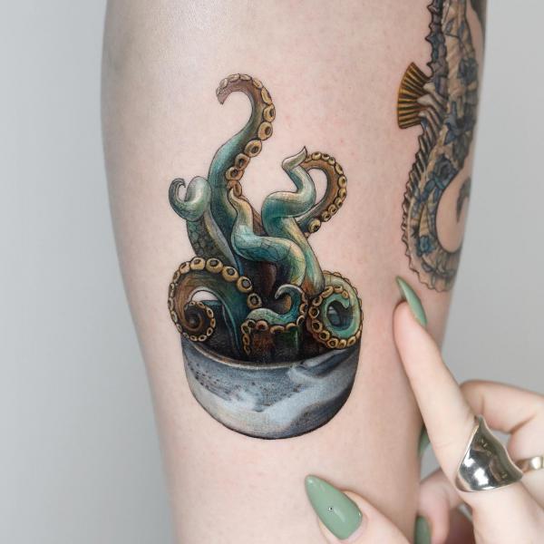 Neo traditional octopus in bowl tattoo