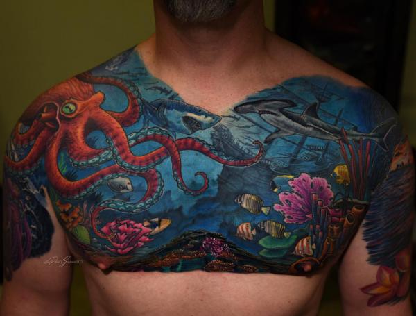 Octopus and shark chest tattoo