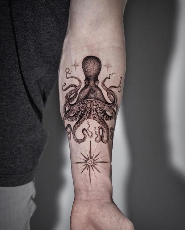 Octopus and stars tattoo on inner forearm