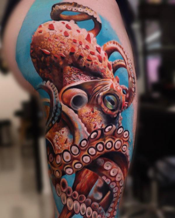 Realistic Octopus thigh tattoo