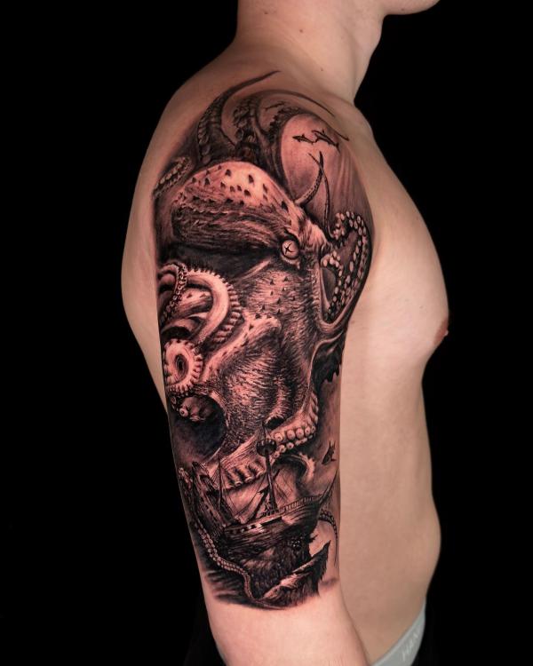 Realistic octopus shark and shipwreck tattoo