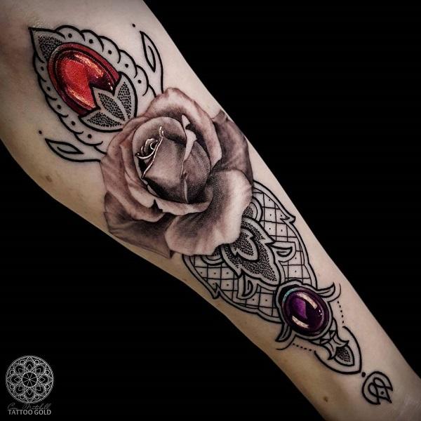 Rose and diamond forearm tattoo